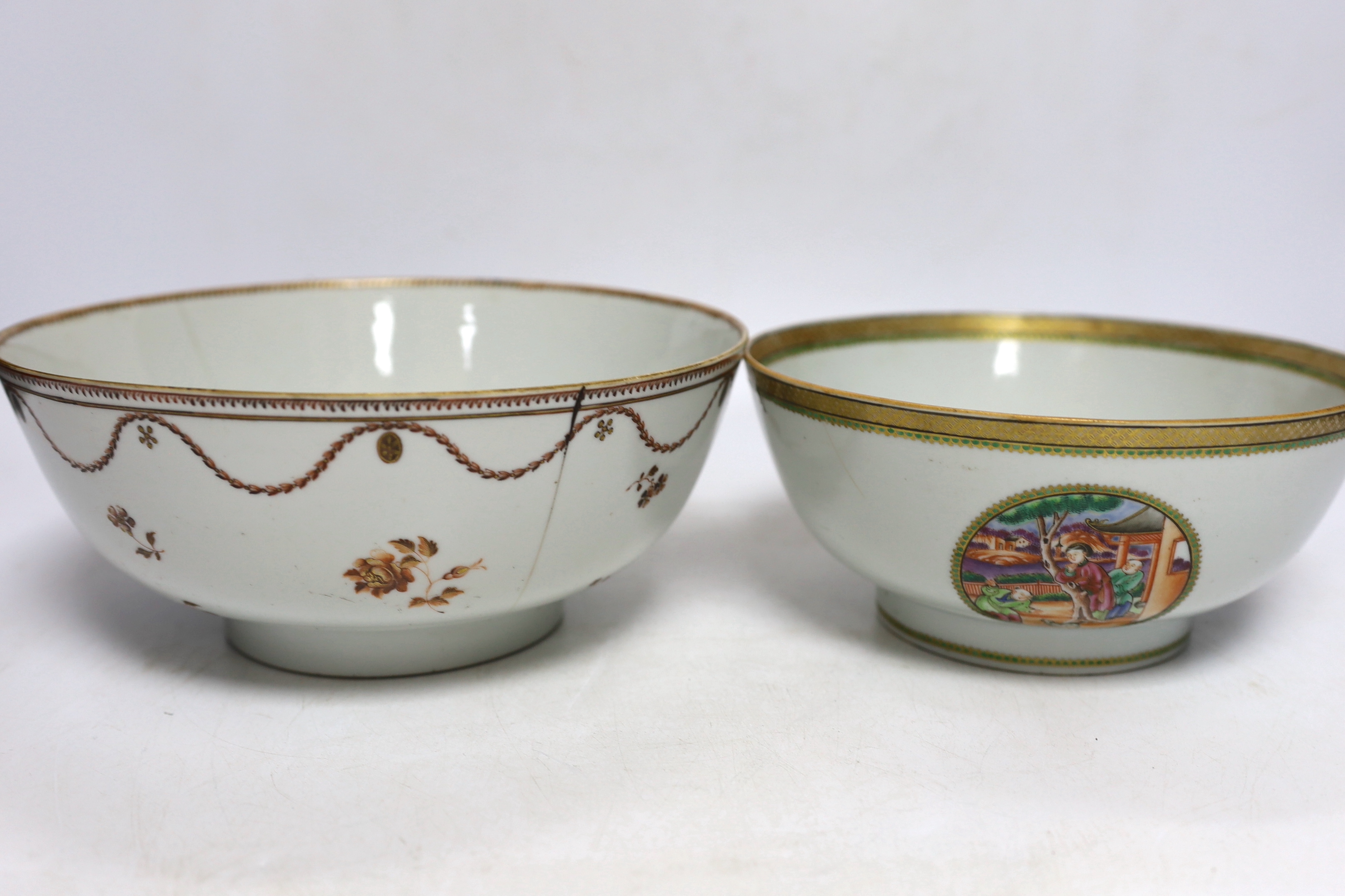 A Chinese famille rose bowl and dish and two similar bowls, all Qianlong period, largest diameter 23cm